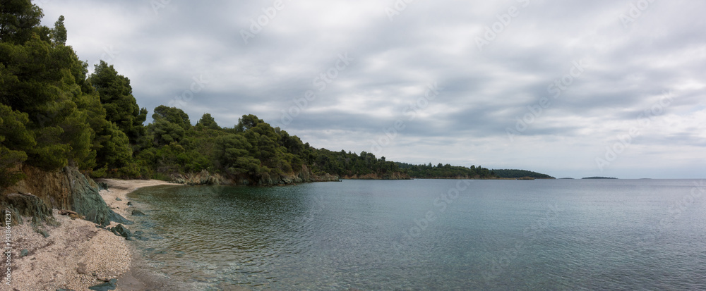 Beautiful scenery by the sea under a cloudy sky in Sithonia, Chalkidiki, Greece