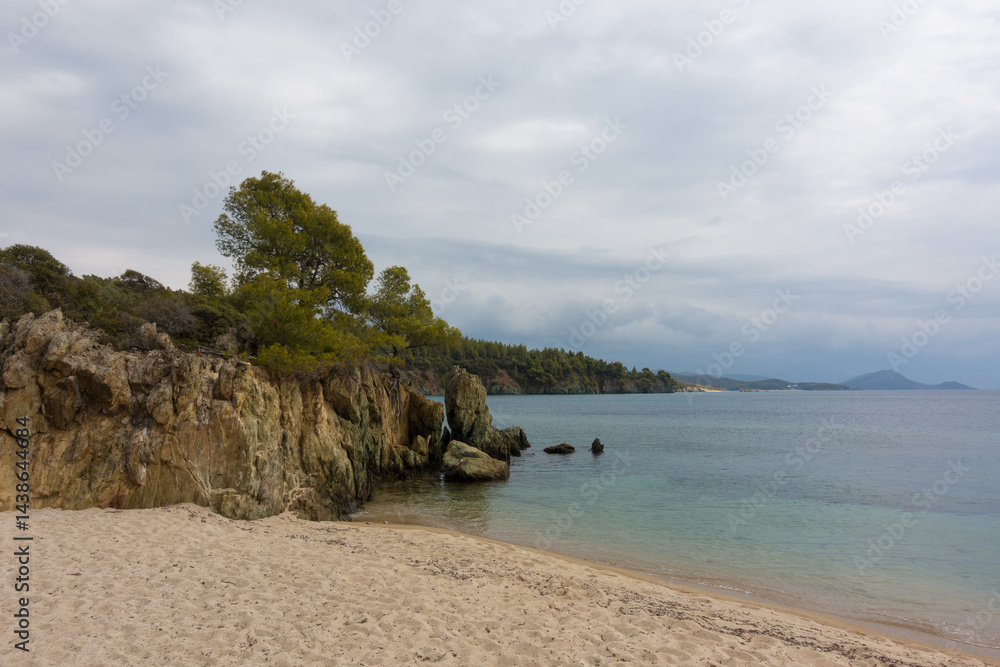 Beautiful scenery by the sea under a cloudy sky in Sithonia, Chalkidiki, Greece