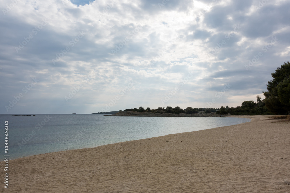 Beautiful scenery by the sea under a cloudy sky in Sithonia, Chalkidiki, Greece
