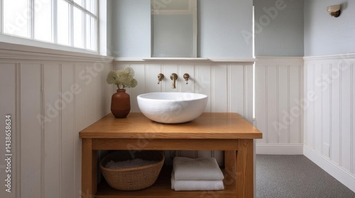 Wallpaper Mural Modern bathroom with a wooden vanity in the center. the vanity has a white vessel sink with two gold faucets and a small vase with a plant on top. Torontodigital.ca