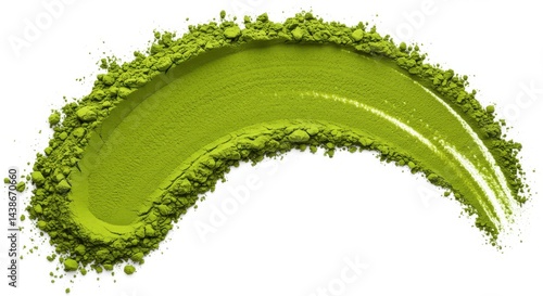 A curved smear of vibrant green matcha powder against a stark white background in a studio shot