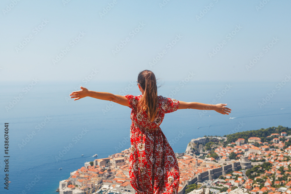 Experience the Freedom and Joy Embracing the Stunning View Over Dubrovniks Landscape