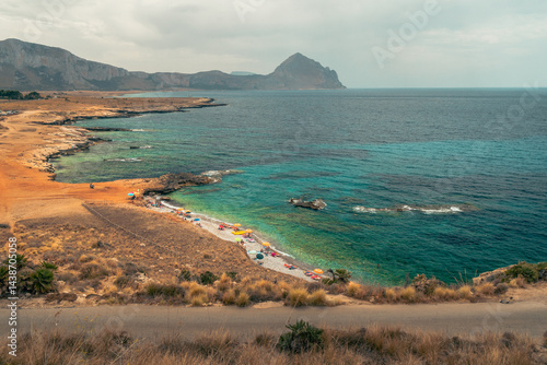 Panoramic view of Caletta del Bue Marino, San Vito Lo Capo,  Spiaggia di Isulidda, Trapani, Sicily, Italy. Dramatic clouds.