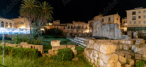 Fototapeta Naklejka Na Ścianę i Meble -  Panoramic view of the old town of Syracuse in Sicily, Italy in a beautiful warm night. Travel and sightseeing journey concept.