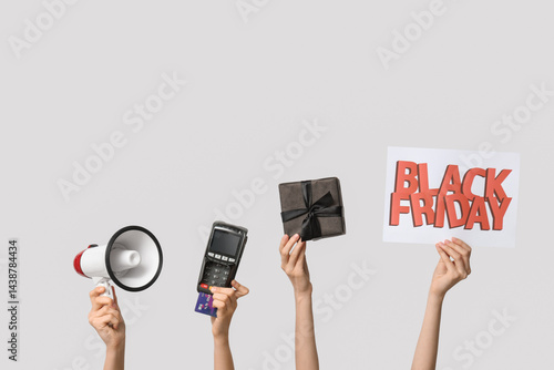 Female hands with megaphone...