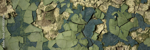 Obraz na płótnie Peeling paint on the wall. Panorama of a concrete wall with old cracked flaking paint. Weathered rough painted surface with patterns of cracks and peeling. Wide panoramic texture for grunge background w salonie
