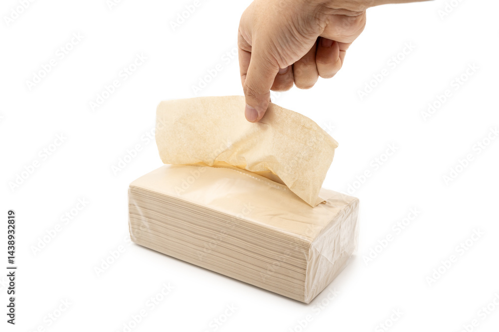 Hand taking Brown tissue paper pack isolated on white background.