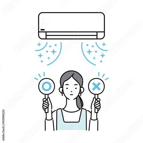 エアコンの疑問解決！回答札を持つ女性