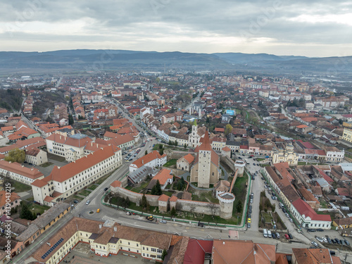 Obraz na płótnie Aerial view of Aiud Nagyenyed fortified protestant church in Romania with walls and towers in the middle of the town w salonie