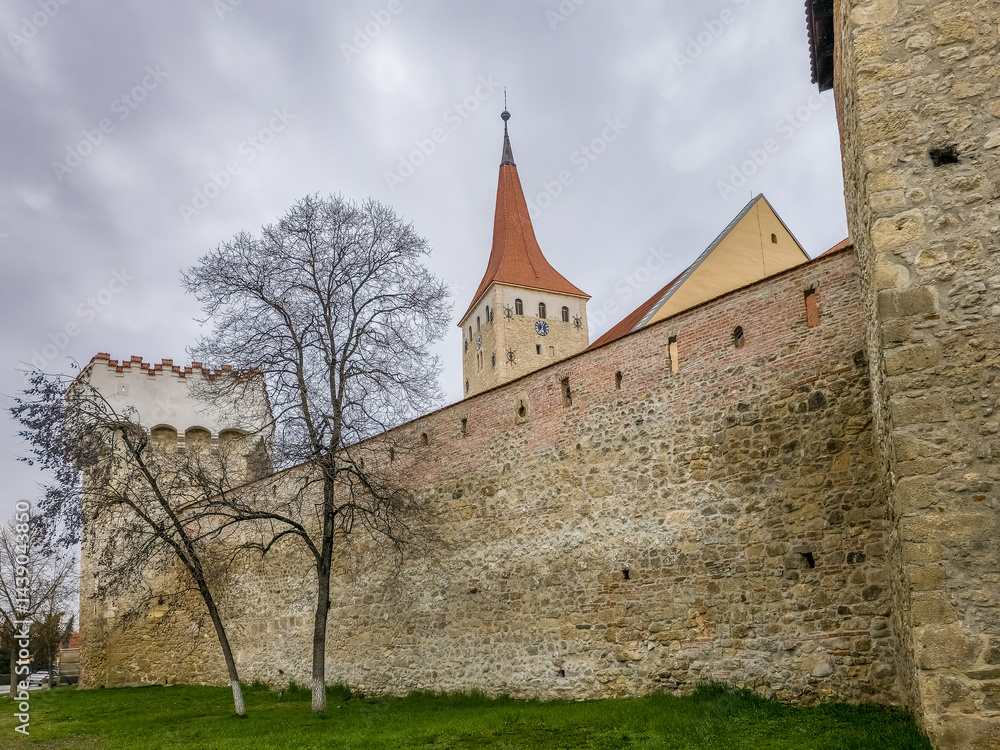 Newly restored Tanner guild bastion, battlements, Aiud Nagyenyed fortified protestant church in Romania with walls and towers in the middle of the town