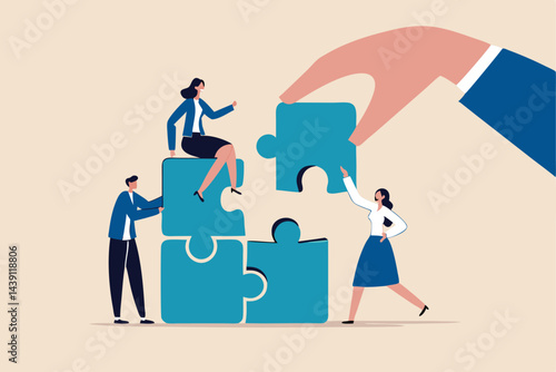 Build your team, leadership to develop teamwork or business partner, cooperate or collaborate for success, assist or help, giant businessman hand connect last jigsaw puzzle to office business team.