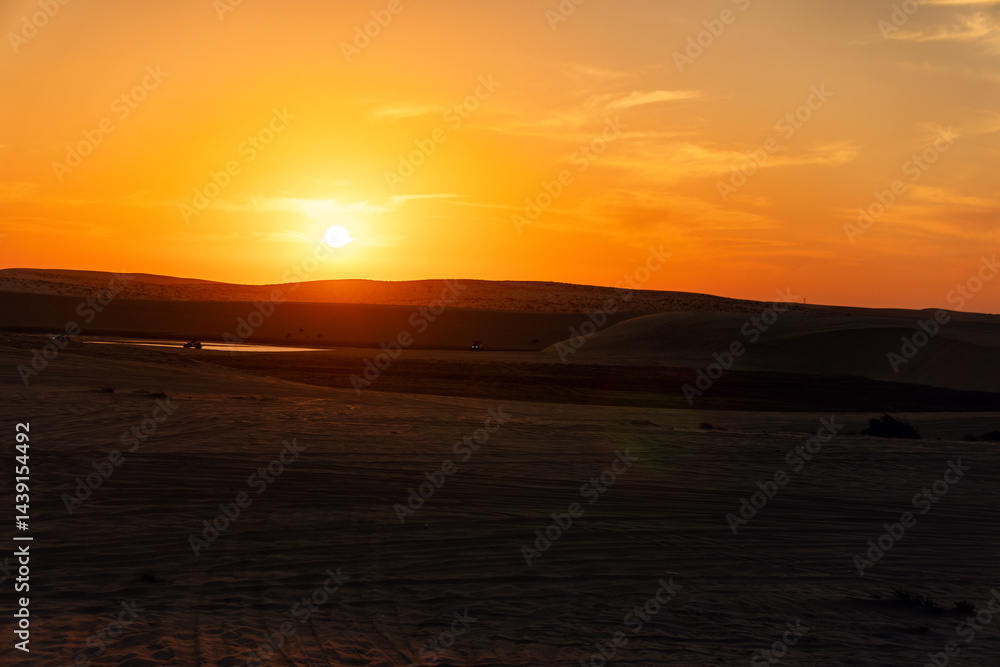 A bright yellow orange dawn in the desert. Desert Golden Hour Evening Desert