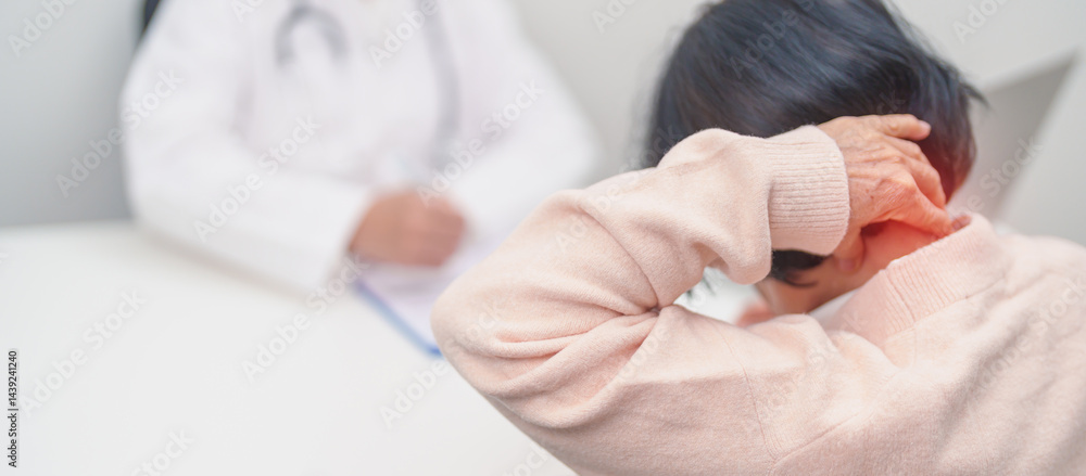 Elderly Woman having Shoulder and Neck and consulting doctor in hospital. Muscle painful due to Myofascial pain syndrome and Fibromyalgia, rheumatism, Scapular pain, Cervical Spine. ergonomic concept Elderly Woman having Shoulder and Neck and consulting doctor in hospital. Muscle painful due to Myofascial pain syndrome and Fibromyalgia, rheumatism, Scapular pain, Cervical Spine. ergonomic concept