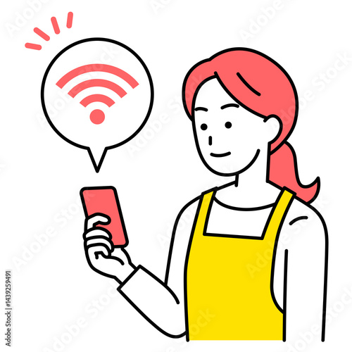 Wi-Fi-に繋がっているスマートフォンを持つエプロン姿の女性