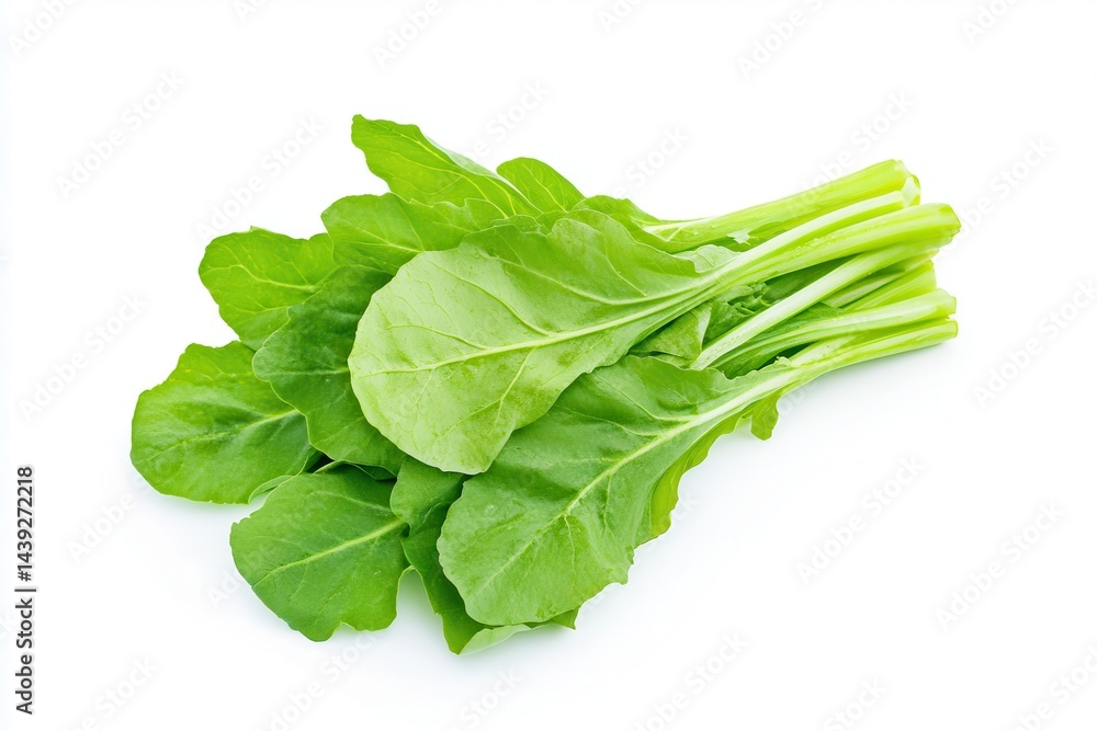 Fresh green arugula leaves arranged neatly on a white background, perfect for culinary use Fresh green arugula leaves arranged neatly on a white background, perfect for culinary use