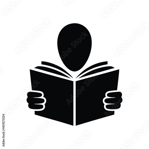 Silhouette of a Person Reading a Book
