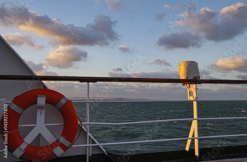Obraz na płótnie Beautiful breathtaking sunset blue hour twilight panorama at sea with dramatic sky seen from outdoor deck of classic cruiseship cruise ship liner sailing on ocean w salonie