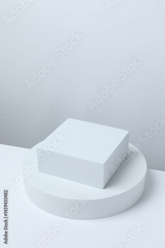White podiums on a light background