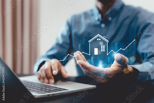 Real estate investment concept . Businessman use laptop with house icon for analyzing mortgage loan home and insurance real property mortgage. business real estate.