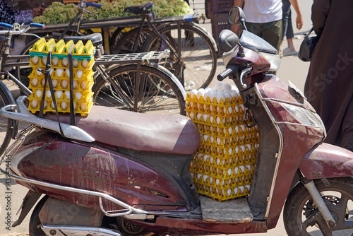 egg delivery  on a motorbike in Mumbai