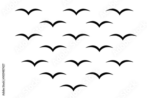 Silhouette of a flock of birds flying in the sky isolated on white background