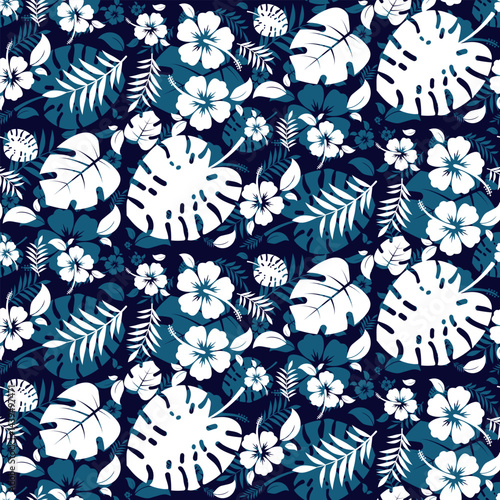 Pattern blue Hawaiian decor with flowers and tropical leaves.