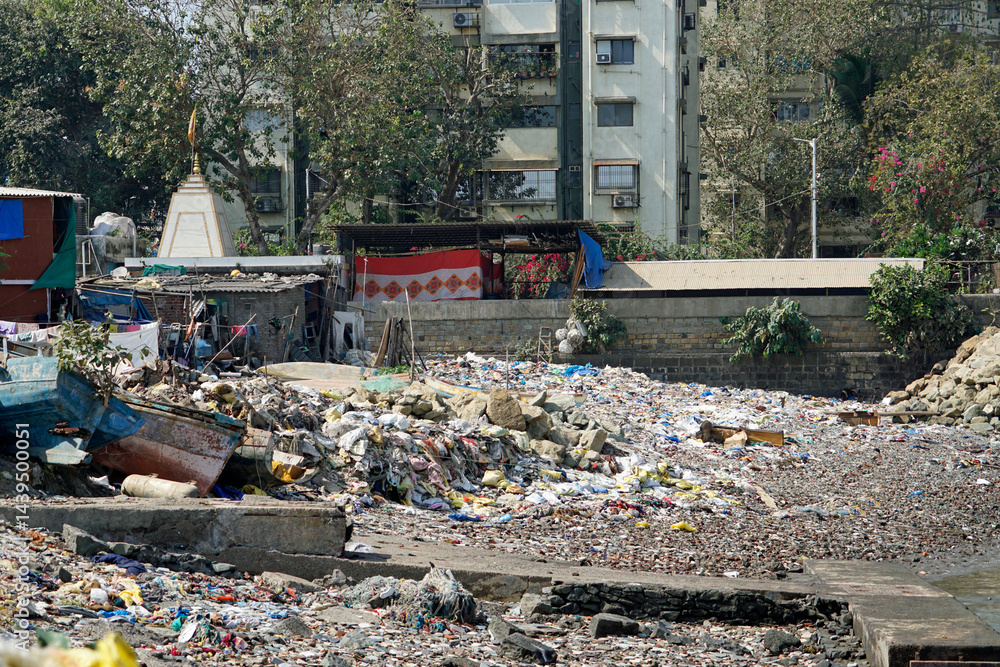 garbage dump in a fisherman district in mumbai