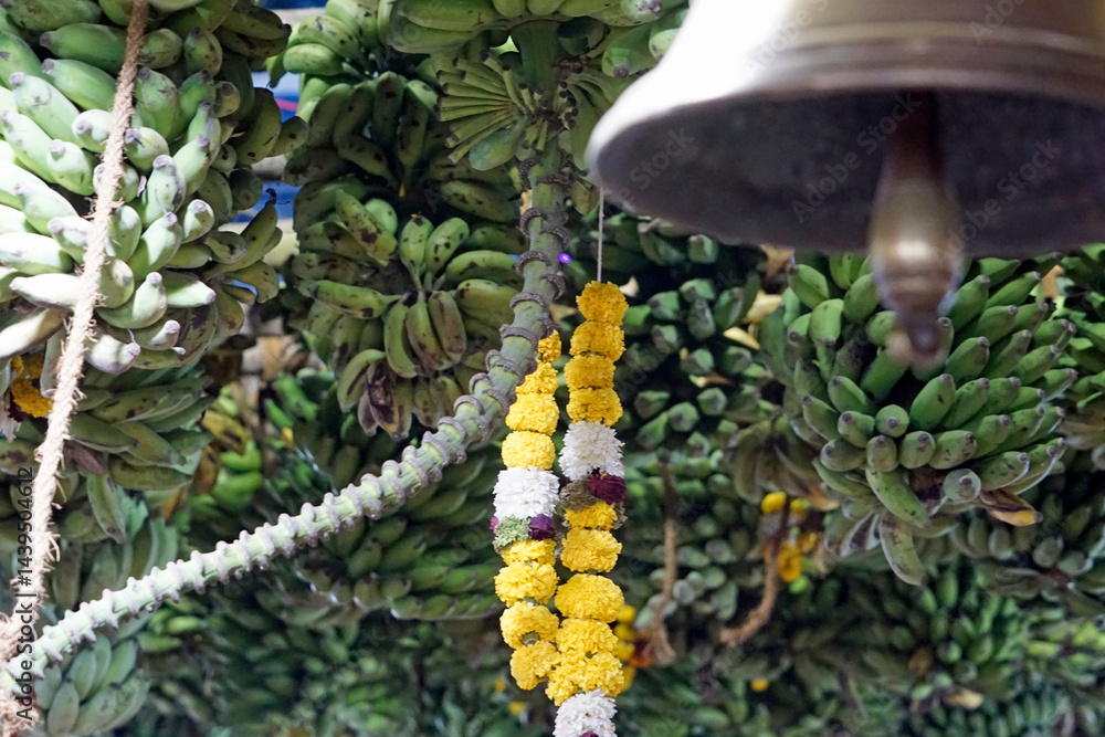 bell in the sky full of bananas at banana festival