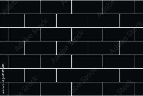 Pattern of black and white bricks arranged in a traditional horizontal layout