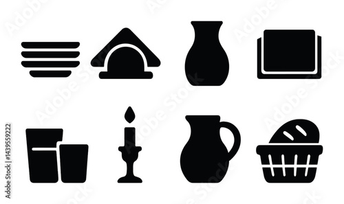 Homeware and kitchen silhouette icons set – solid style dining, decoration, and essentials symbols for interior design: plates, napkin holder, vase, glasses, candle, pitcher, bread basket.