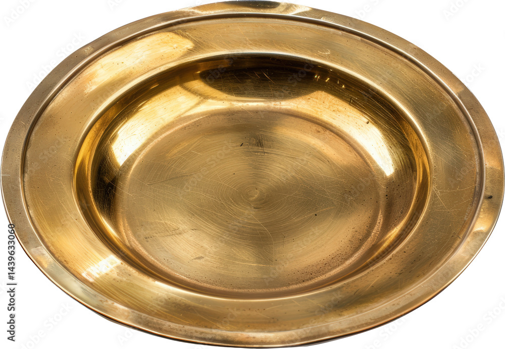 Shiny round brass plate close-up