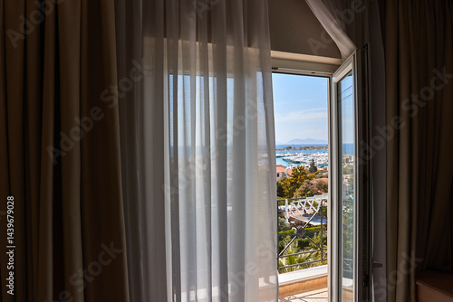 Apartment with sea view, open balcony door