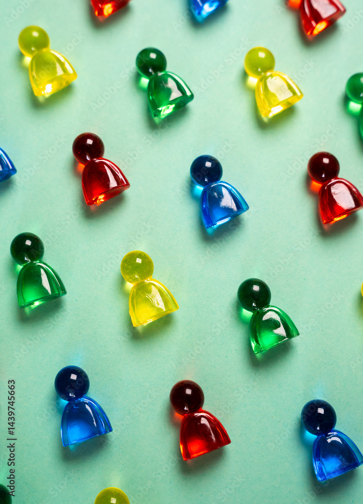 Multi-colored figures of people on a turquoise background. Concept of sociology, psychology, consumers and marketing. Multiculturalism. Different people. Hiring and recruiting for work. Search talents