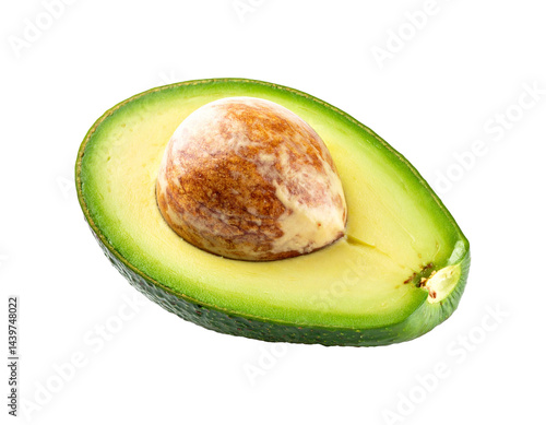 Half an avocado showing the seed and light green flesh, PNG