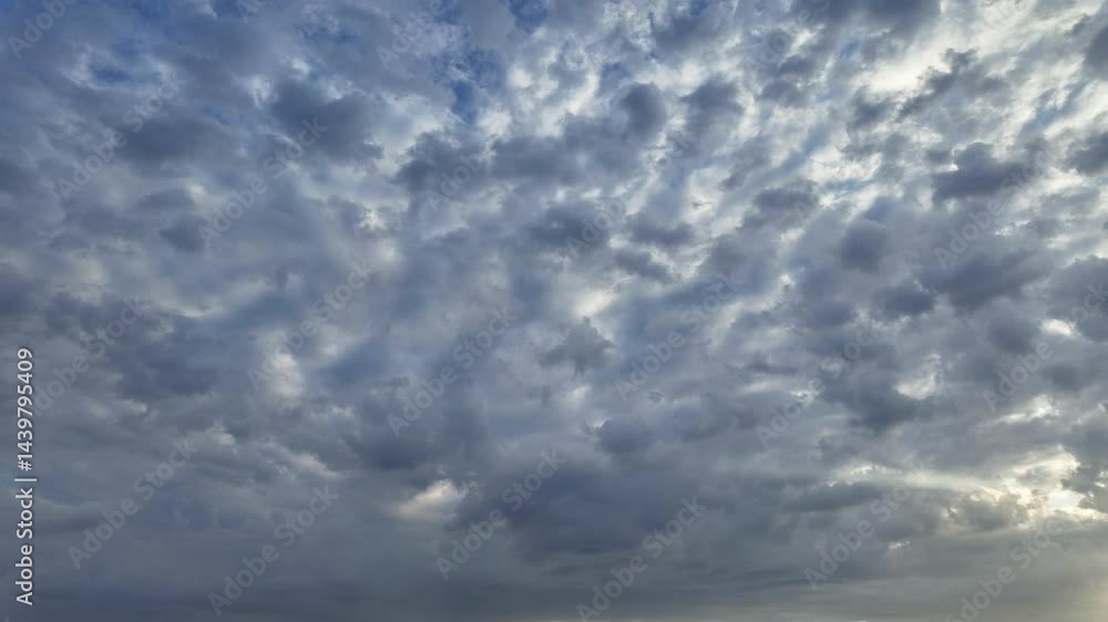 Timelapse of two cloud layers moving in opposite directions