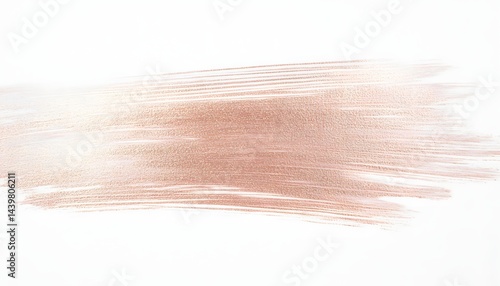 A single brush stroke of pink gold paint on white paper