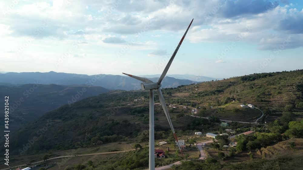 Windmill on Mountain Ridge Under Dramatic Sky, Renewable Energy for Greener Planet Windmill on Mountain Ridge Under Dramatic Sky, Renewable Energy for Greener Planet
