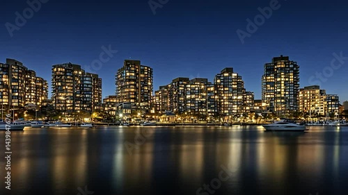 Wallpaper Mural Illuminated City Skyline Reflecting on Water at Dusk Torontodigital.ca