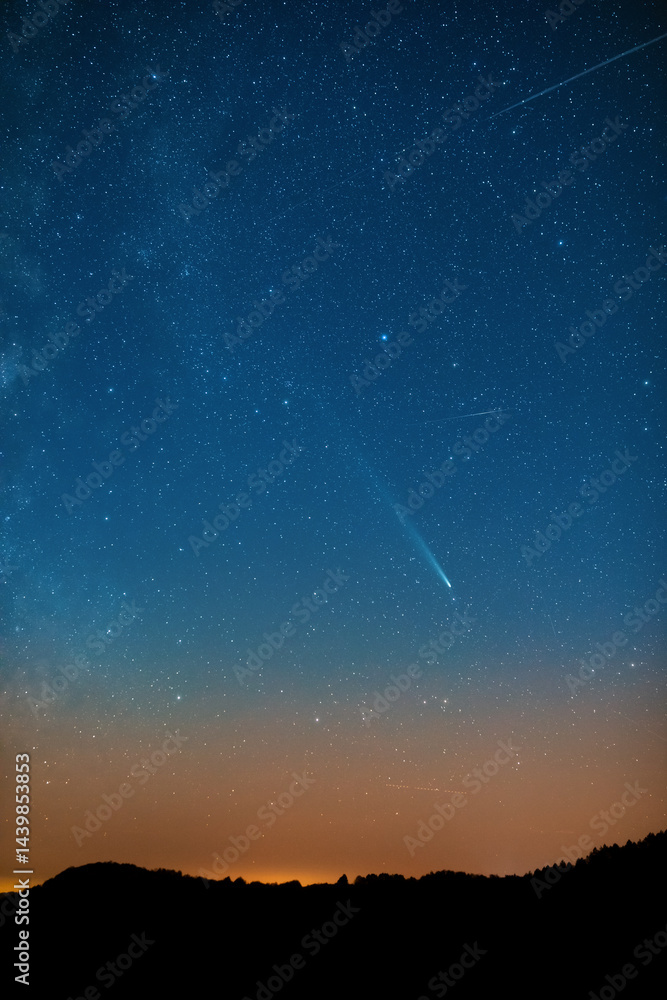 Comet C2023A3 Tsuchinshan ATLAS with Milky Way stars photographed from northern hemisphere in October 2024.