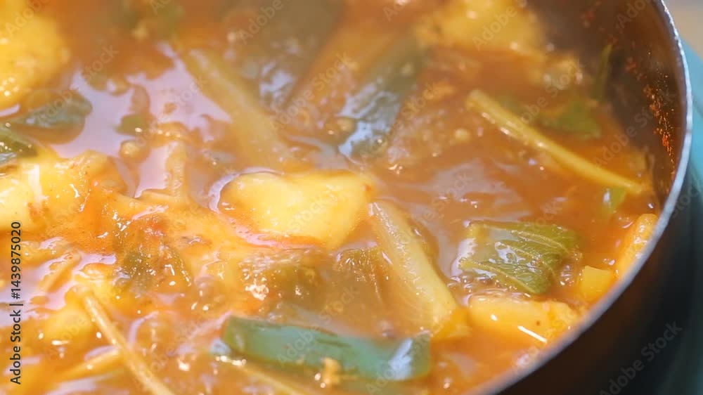 Spicy floating goby stew boiling in a pot Spicy floating goby stew boiling in a pot