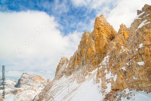Obraz na płótnie View of the Dolomites, Italy. Mountain landscapes with snow and ice. Sharp rocks as a background. Place for mountain hiking, traveling and vacation. Wallpaper, postcard, photo. w salonie