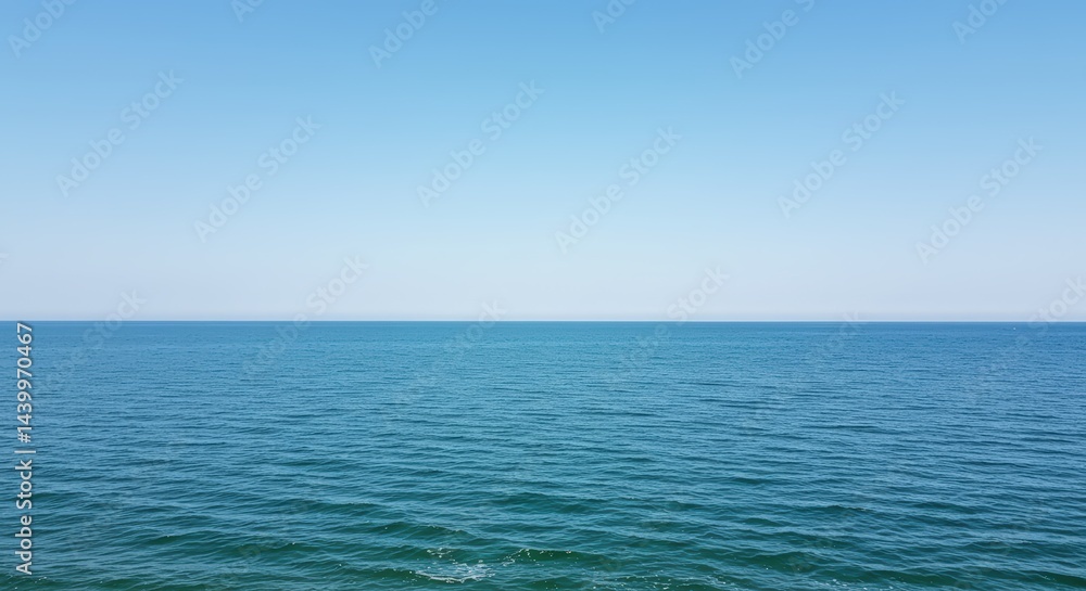Calm blue ocean water surface with minimal ripple pattern for a calming background or abstract concept of tranquility and peace in nature for website backdrop Calm blue ocean water surface with minimal ripple pattern for a calming background or abstract concept of tranquility and peace in nature for website backdrop