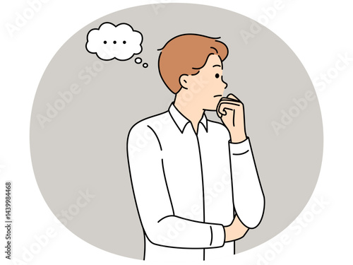 Man thinks about ways to solve problem that has arisen and touching chin looks to side