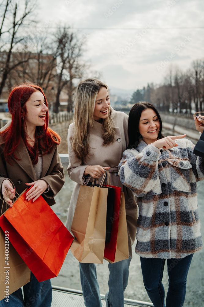 Group of three female friends walk home happy and excited with shopping bags
Group of three female friends walk home happy and excited with shopping bags