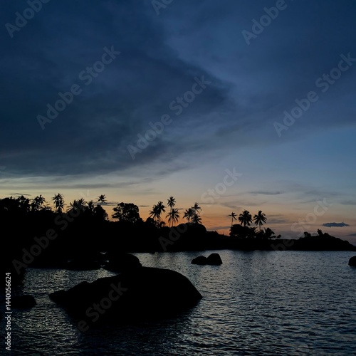sunset over the sea silhouette
