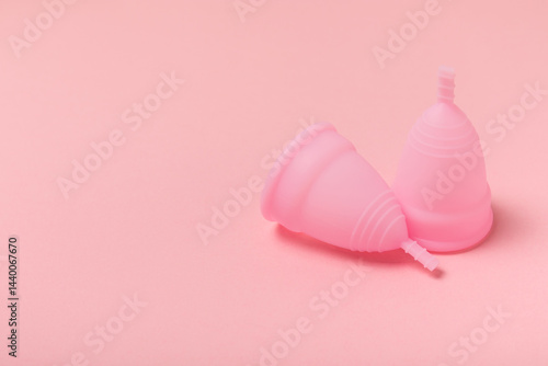 Obraz na płótnie Menstrual cup on a bright background. Sanitary napkins, tampons and menstrual cup.Concept of critical days, menstruation.feminine hygiene product. Women health concept.Premenstrual syndrome.Copy space w salonie