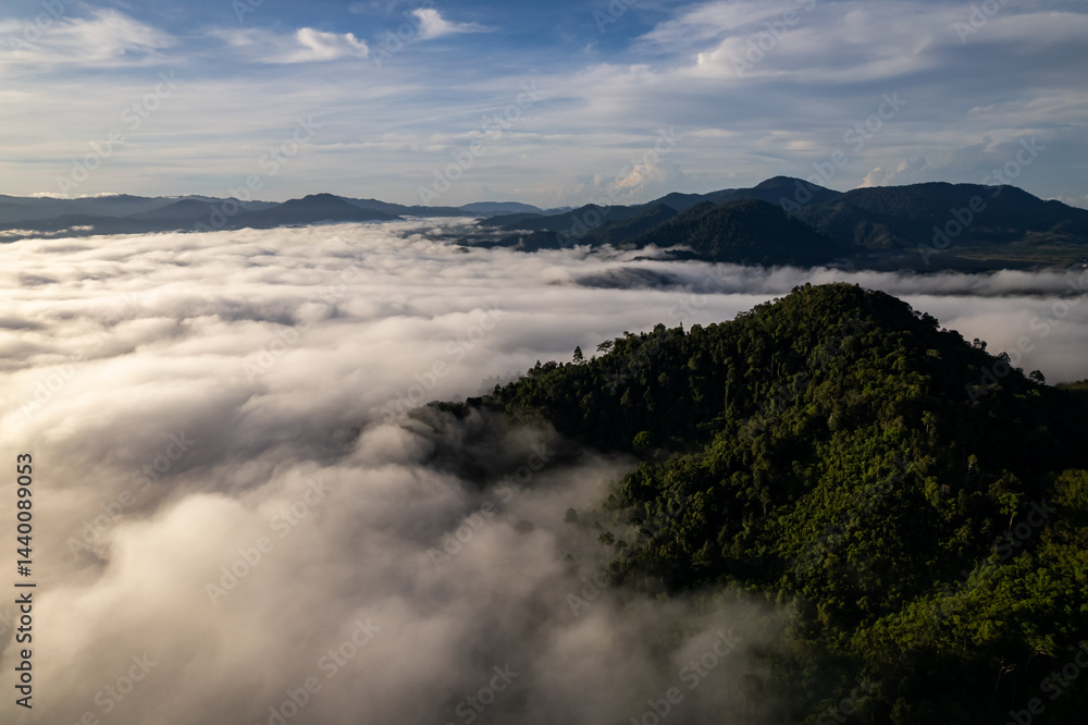 High angle view drone view of fog in rainy season over mountains,Beautiful sunrise sky clouds nature background High angle view drone view of fog in rainy season over mountains,Beautiful sunrise sky clouds nature background
