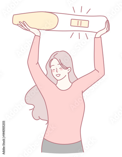 A joyful woman happily holding a pregnancy test, expressing her happiness and surprise at the result