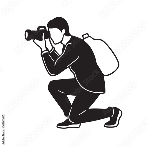 Photographer kneeling taking professional photo shot