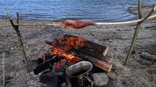 Making a drink on a fire in the forest. Tea. Coffee on the fire.